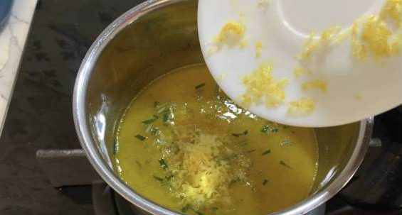 Adding grated lemon zest to butter